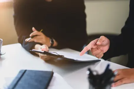 lawyer explaining documents to client